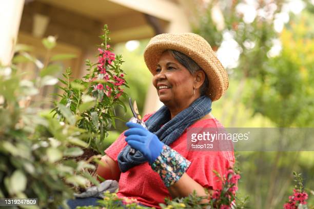 black woman with plant